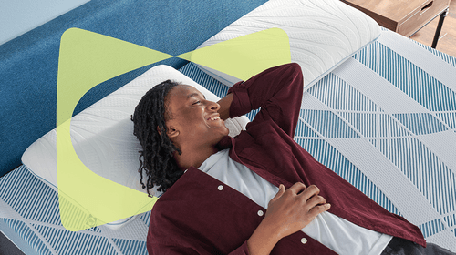 Man laying on DreamLife mattress with butterfly frame