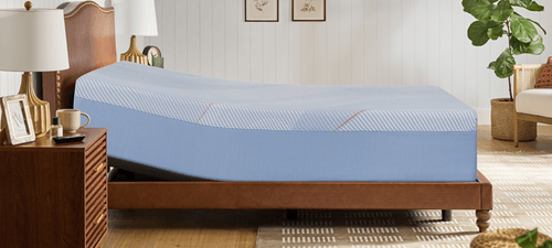 Posturepedic Hybrid mattress on adjustable base in a styled room - mobile