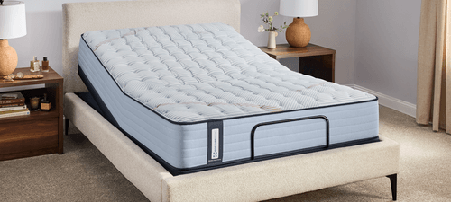 Posturepedic Spring mattress on an Ease Power base in a styled room - mobile