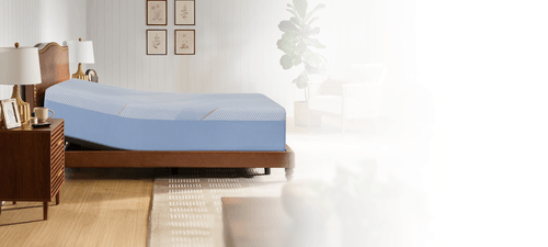 Posturepedic Hybrid mattress on adjustable base in a styled room